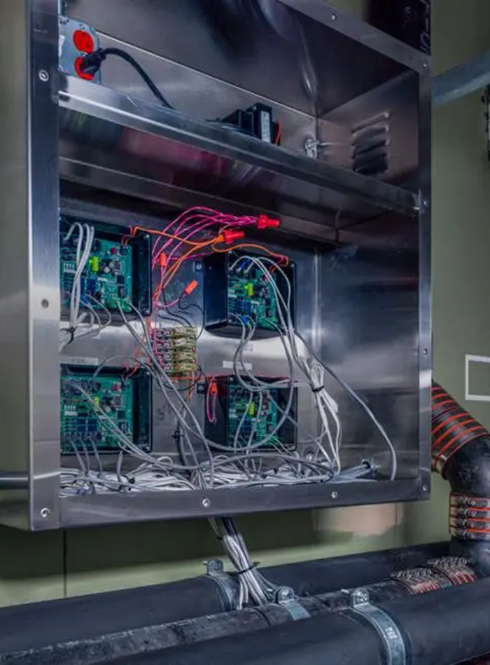 electronic control cabinet inside the technical area of the Stanton Correctional Facility, designed for the centralized management of Sloan’s intelligent plumbing systems.