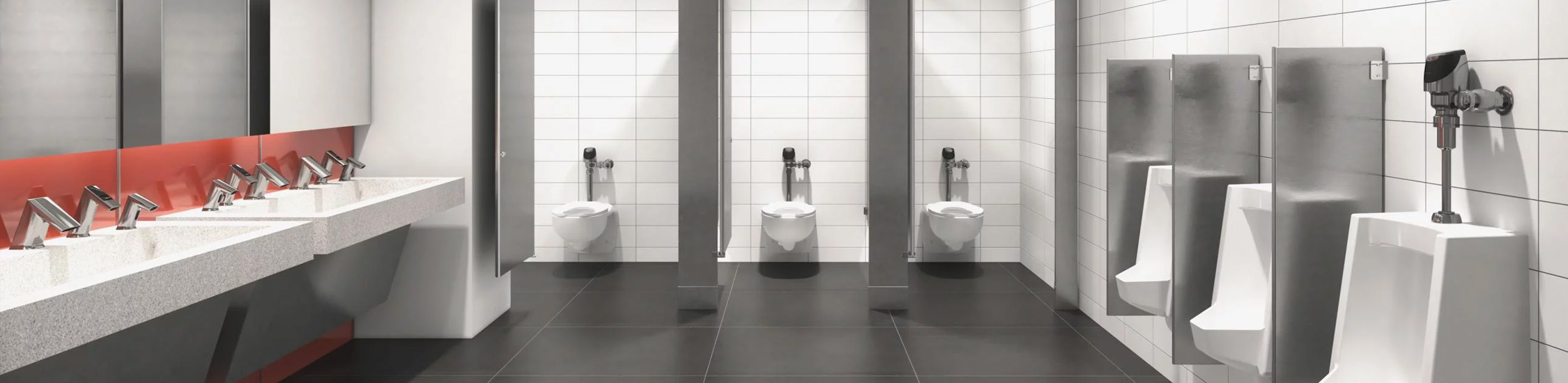 a modern commercial restroom featuring Sloan® flushometers on each fixture.