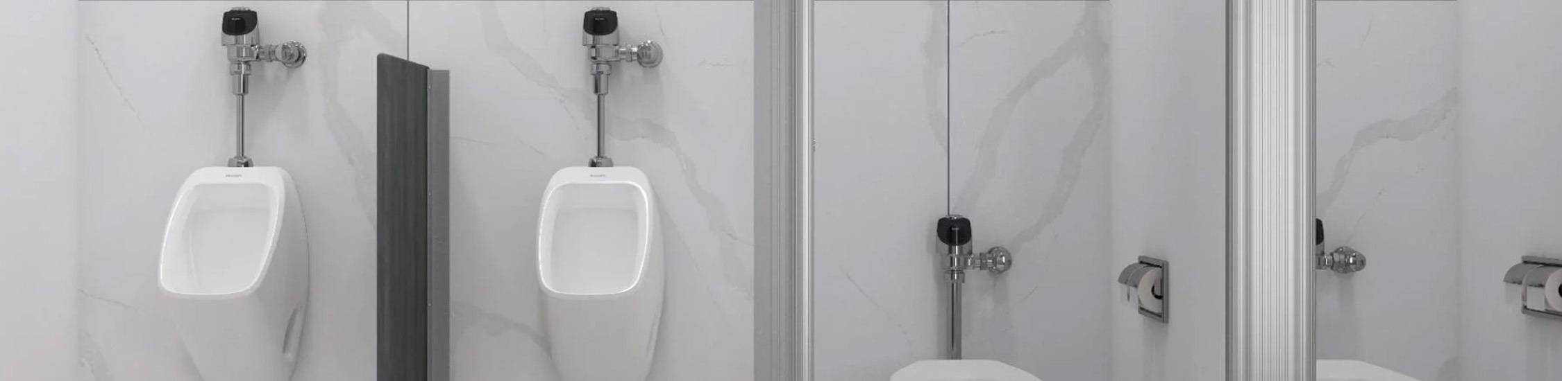 The wall-mounted urinals and toilets are fitted with Sloan® chrome flushometers, optimizing space and ensuring easy maintenance.
