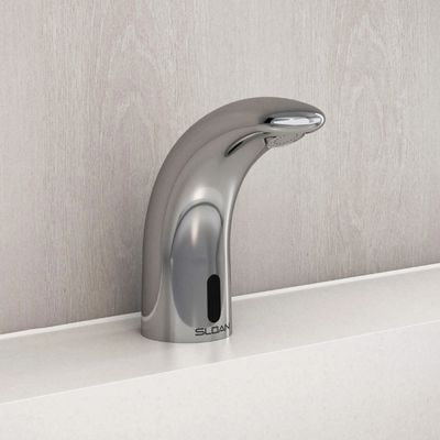 Sloan automatic faucet with curved chrome design, mounted on a white countertop with a light gray textured background.
