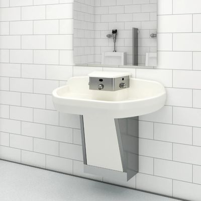 Lavabo blanco individual con sistema integrado Sloan de grifo, dispensador de jabón y secador de manos, frente a una pared de azulejos blancos con un espejo rectangular encima.
