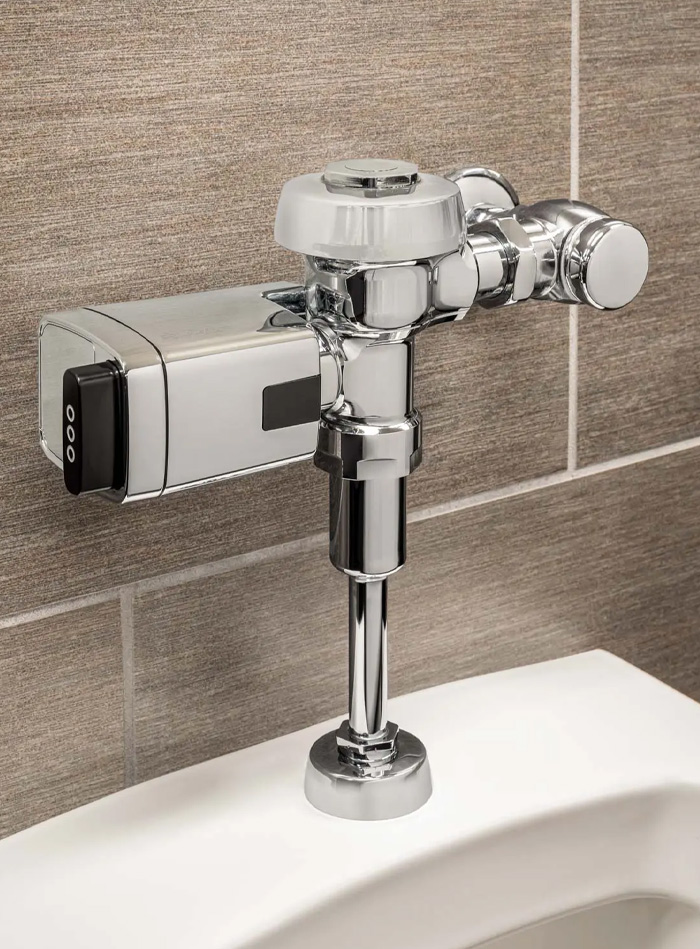 Sloan flushometer installed in the restrooms at PPG Paints Arena. Its polished chrome finish highlights a sleek and precise design, while the automatic sensor technology ensures a touch-free, efficient flush.