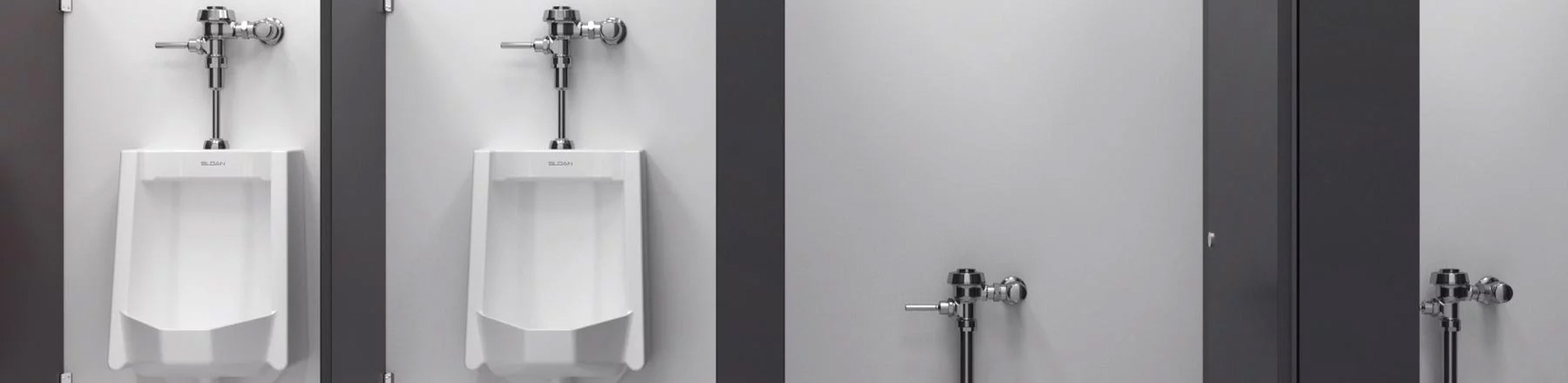The wall-mounted urinals and toilets are fitted with Sloan® chrome flushometers, optimizing space and ensuring easy maintenance