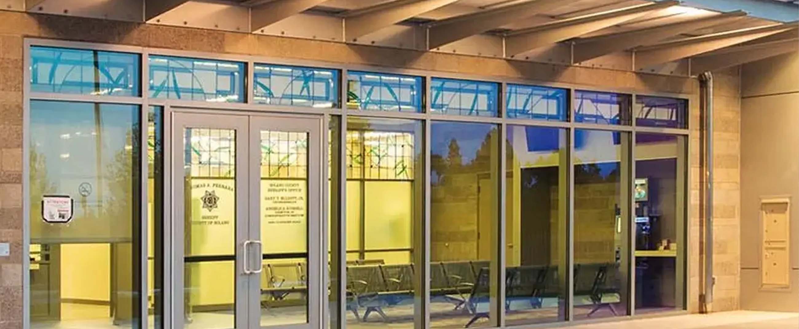 the façade of the Stanton Correctional Facility, a modern complex designed with a focus on security, operational efficiency, and sustainability.