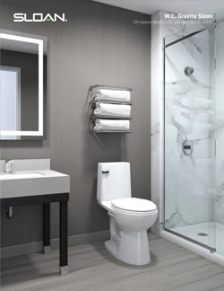 sleek, contemporary bathroom featuring Sloan’s W.C. Gravity toilet. Its modern design, complemented by neutral tones and high-quality finishes, delivers a clean and functional aesthetic ideal for hotels, residential spaces, or commercial environments.