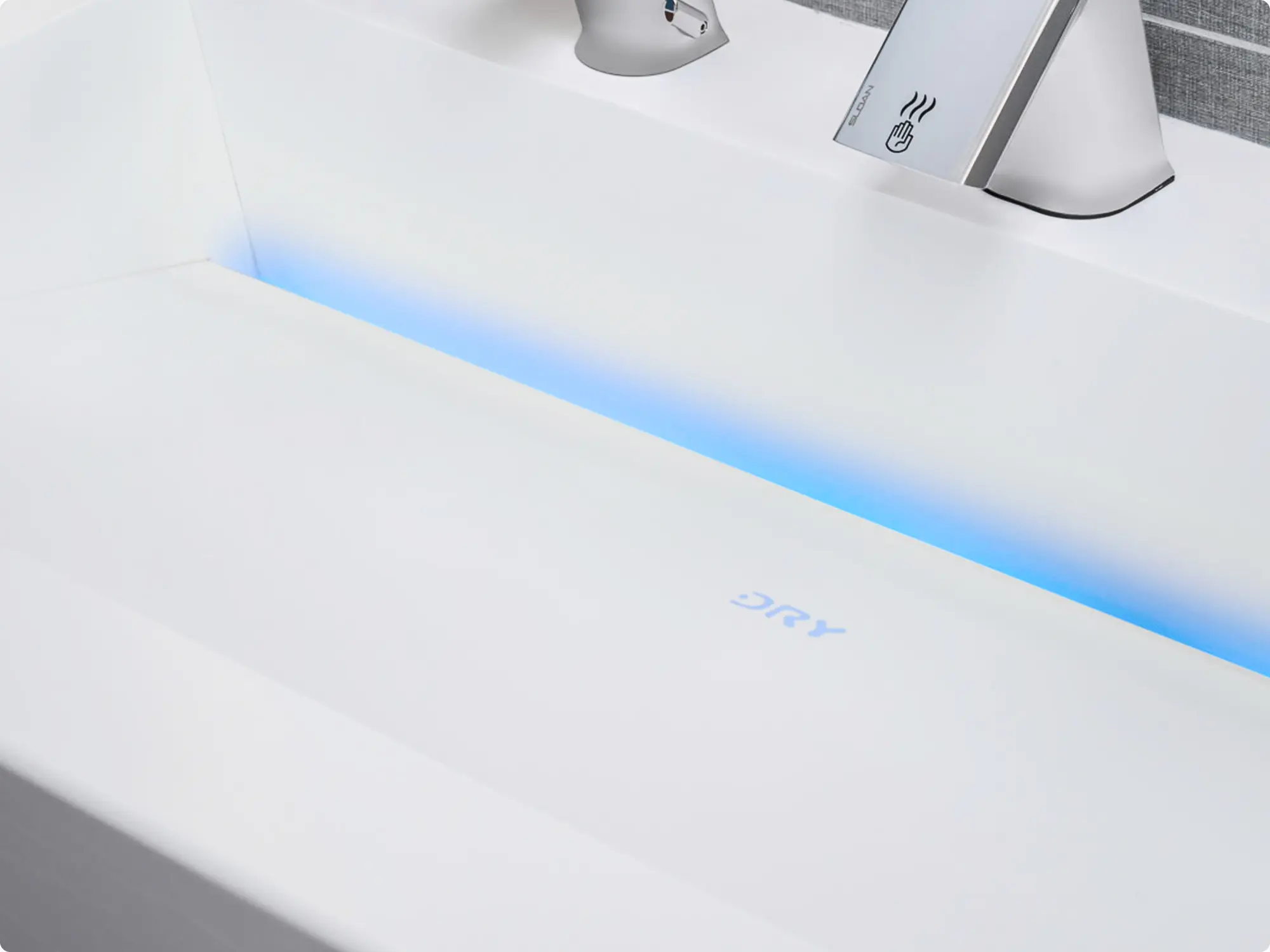 LED-illuminated sink basin with “DRY” zone indicator, designed to guide users and enhance the modern aesthetic.