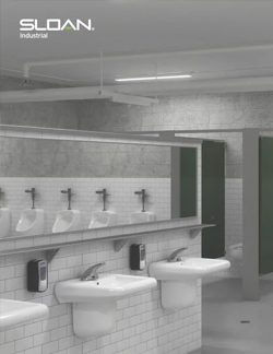 industrial restroom designed with durable and functional materials. The wall-mounted sinks with Sloan automatic faucets, combined with white tile and concrete finishes, create a resilient, hygienic, and low-maintenance environment—ideal for production facilities or high-demand workspaces.