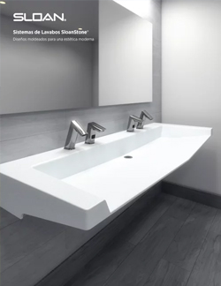 elegant double SloanStone® sink with contemporary touch-free faucets. Its white finish and geometric lines convey modernity, cleanliness, and functionality, representing Sloan’s sink systems designed for modern aesthetics and high-performance environments.