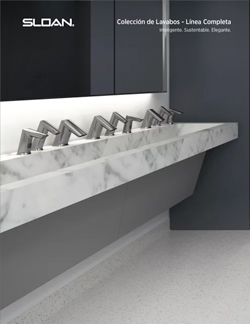 una elegante estación de lavado Sloan con lavabos de superficie sólida tipo mármol y grifería automática alineada. Su diseño moderno y minimalista refleja la combinación perfecta entre sustentabilidad, tecnología y estética, ideal para espacios contemporáneos de alto tránsito.