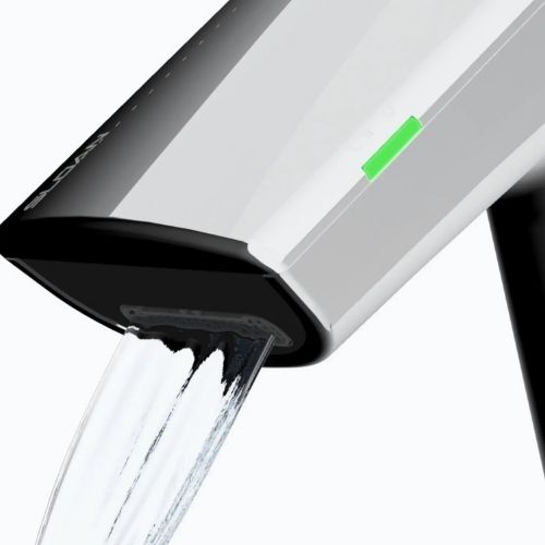 Close-up of Sloan touchless faucet spout with water flow