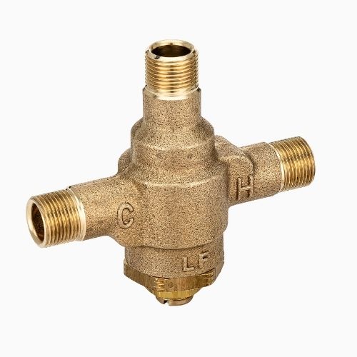 Sloan brass mixing valve with hot and cold water connections.