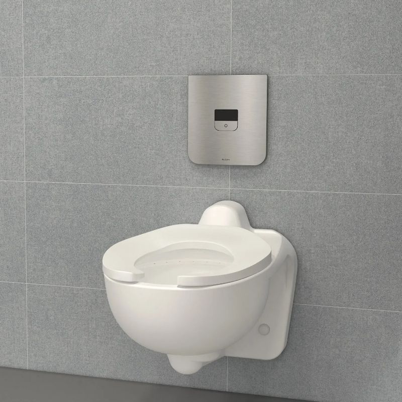 Sloan wall-mounted toilet with touchless flushometer
