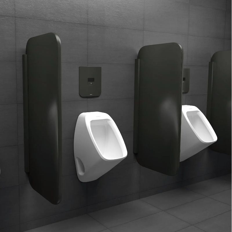 Sloan urinals with sensor-activated flush valves and dark privacy dividers in a modern restroom.