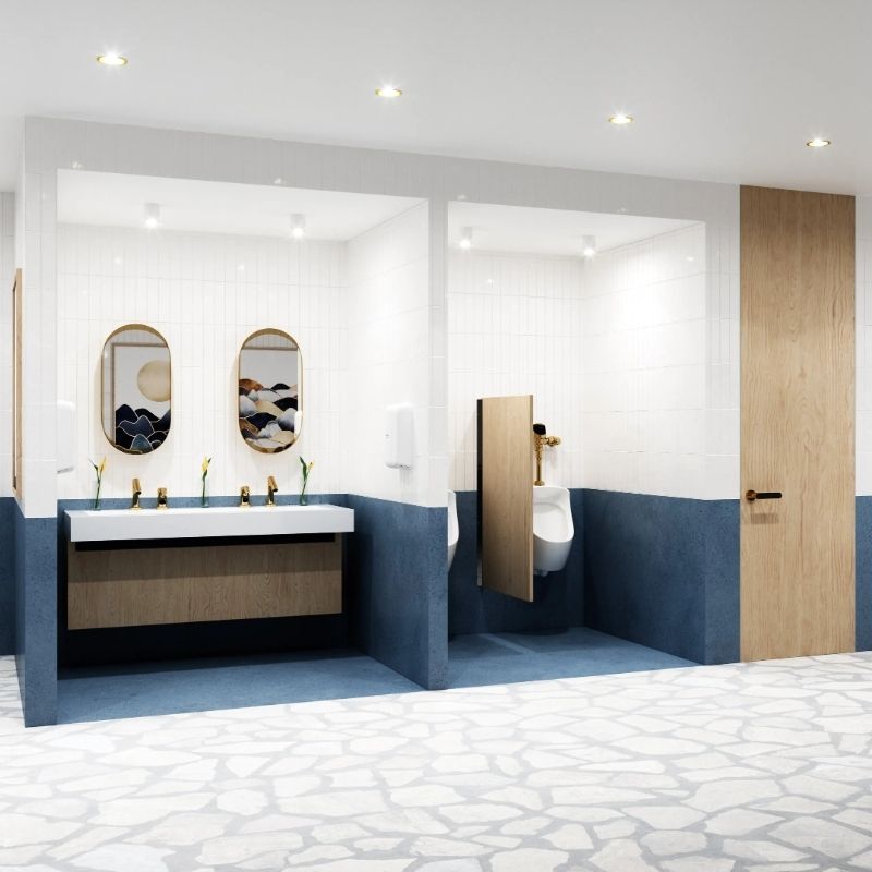Modern restroom with Sloan brass faucets, white and blue tile walls, and urinals separated by wood dividers.