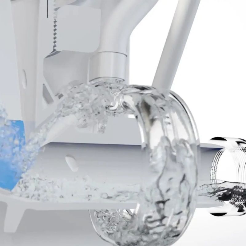 Close-up of Sloan urinal flush technology showing efficient water flow inside the drainage system.